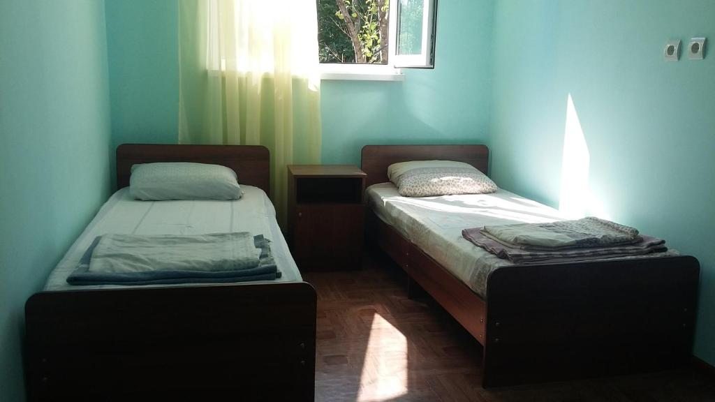 Двухместный (Бюджетный двухместный номер с 2 отдельными кроватями) гостевого дома Медовый, Приморское (Цкуара)