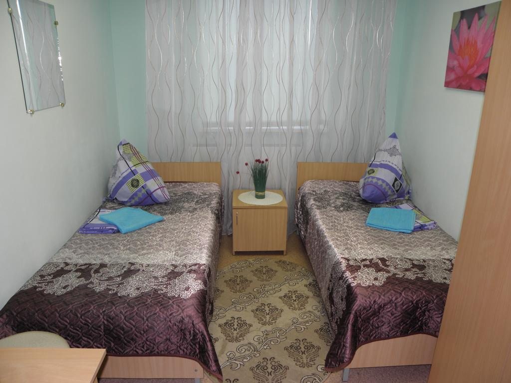 Двухместный (Небольшой двухместный номер с 2 отдельными кроватями) гостиницы Гостиный Дом, Ноябрьск