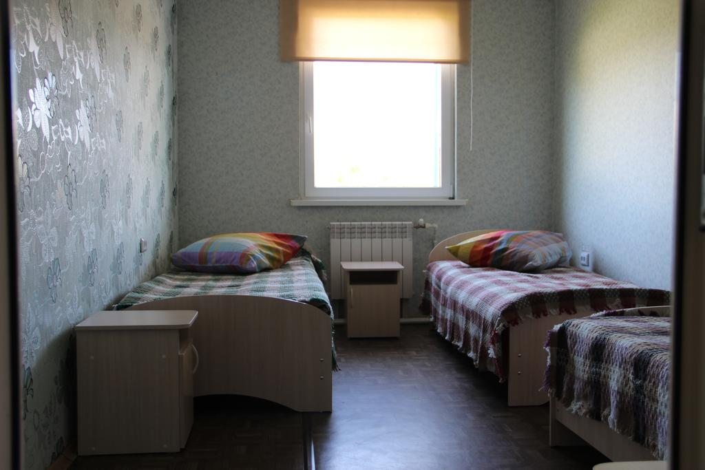Номер (Односпальная кровать в общем номере) гостиницы Север, Северобайкальск