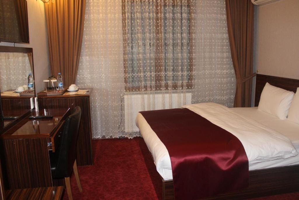 Двухместный (Двухместный номер Делюкс с 1 кроватью или 2 отдельными кроватями, вид на город) отеля Resmina, Ван