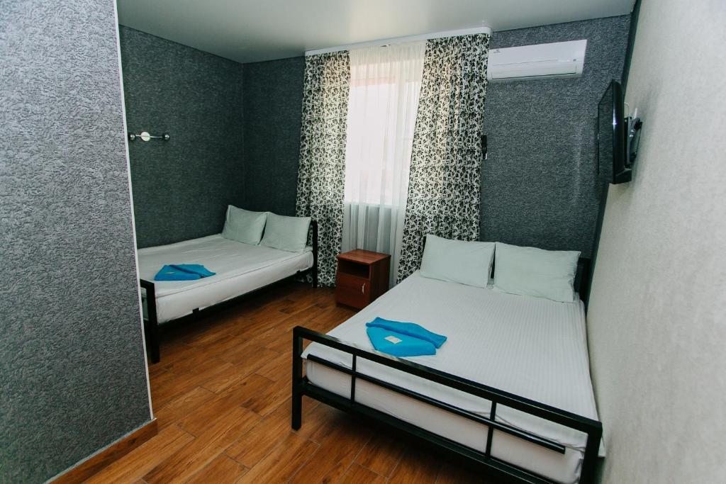 Двухместный (Двухместный номер с 2 двуспальными кроватями) гостевого дома Теремок, Суходол