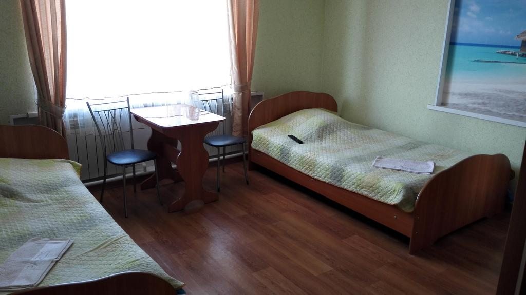 Двухместный (Бюджетный двухместный номер с 2 отдельными кроватями) мотеля На Трассе Волга, Нытва