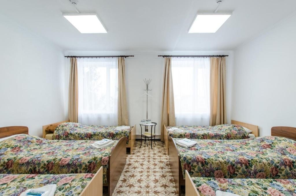 Номер (Спальное место на двухъярусной кровати в общем номере для мужчин и женщин) мини-отеля В Хаапалампи