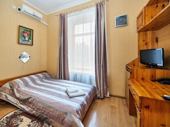 Фотография номера гостиницы Омега-Клуб