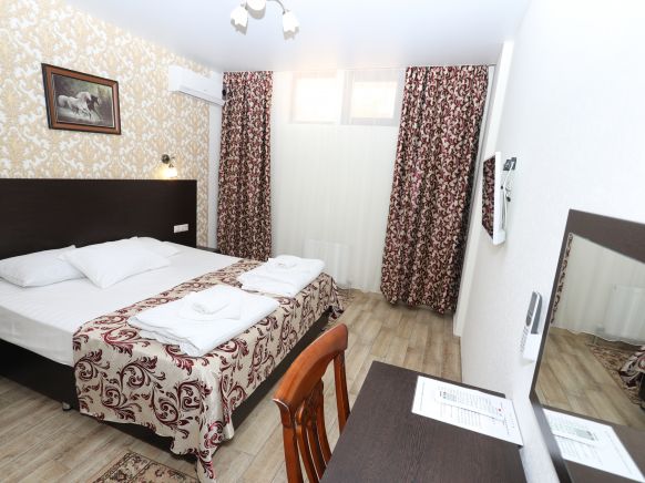 Фотография номера гостевого дома Династия