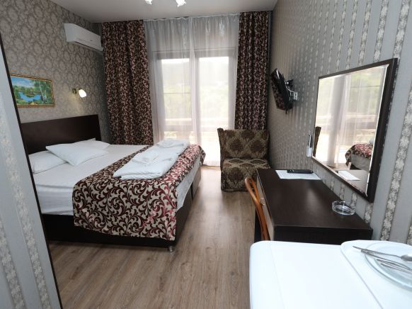 Фотография номера гостевого дома Династия