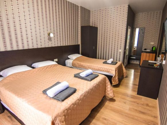 Фотография номера гостевого дома Династия