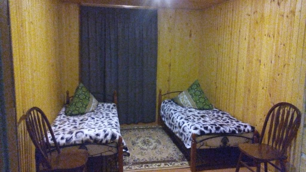 Двухместный (Двухместный номер с 2 отдельными кроватями) загородного отеля Сахалин, Луга