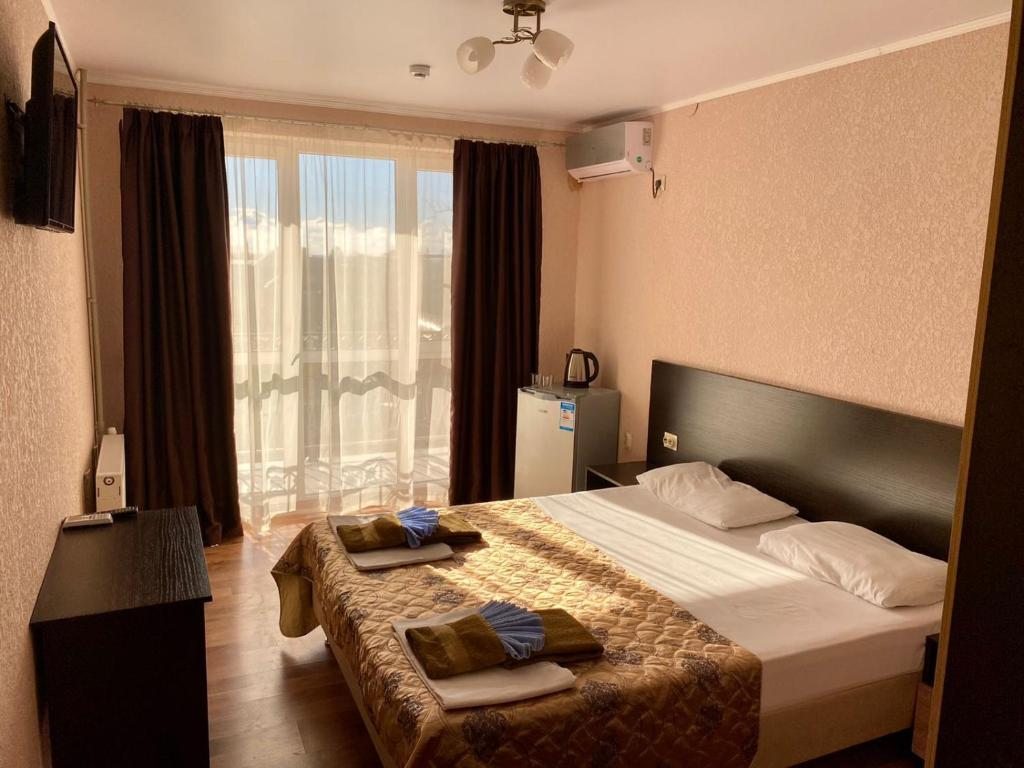 Двухместный (Стандартный двухместный номер с 1 кроватью или 2 отдельными кроватями и балконом) отеля Тристан, Хеивани