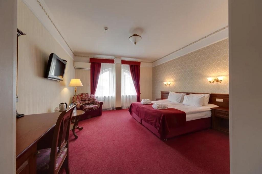 Двухместный (Улучшенный двухместный номер с 1 кроватью или 2 отдельными кроватями) курортного отеля Гранд Петергоф