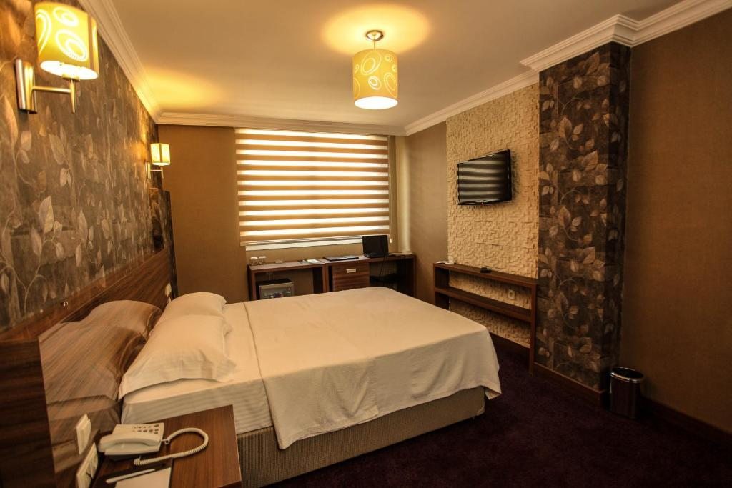 Двухместный (Стандартный двухместный номер с 1 кроватью или 2 отдельными кроватями) отеля Grand Akçalı, Искендерун