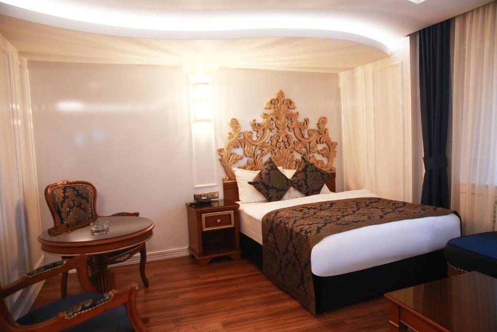 Двухместный (Двухместный номер Делюкс с 1 кроватью или 2 отдельными кроватями и балконом) отеля Asya Park, Тузла