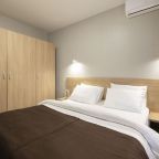 Четырёхместный номер «Делюкс» с балконом и красивым видом