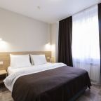 Четырёхместный номер «Делюкс» с балконом и красивым видом