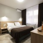 Четырёхместный номер «Делюкс» с балконом и красивым видом