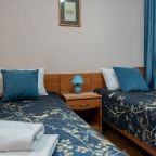 Номер стандарт с раздельными односпальными кроватями