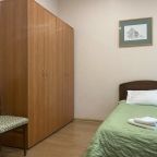 Номер с двумя односпальными кроватями и диваном