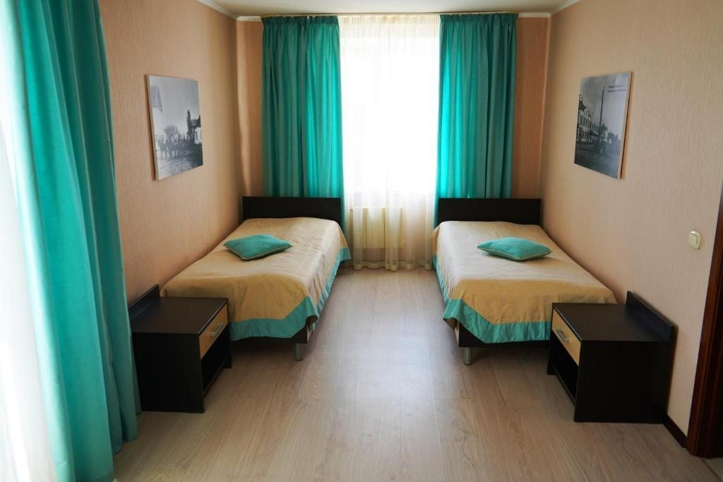 Двухместный (Улучшенный двухместный номер с 2 отдельными кроватями) апарт-отеля СДЛ, Осташков