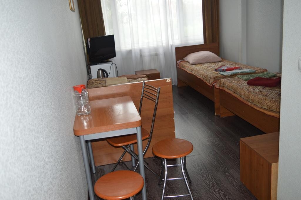 Номер (Односпальная кровать в общем номере) гостиницы Старый Город, Иркутск