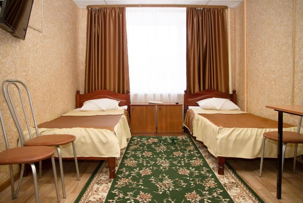 Номер (Кровать в общем номере с 2 кроватями) отеля Север+, Ноябрьск