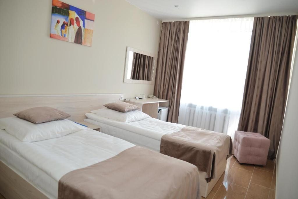 Двухместный (Двухместный номер «Комфорт» с 2 отдельными кроватями) отеля Могилев