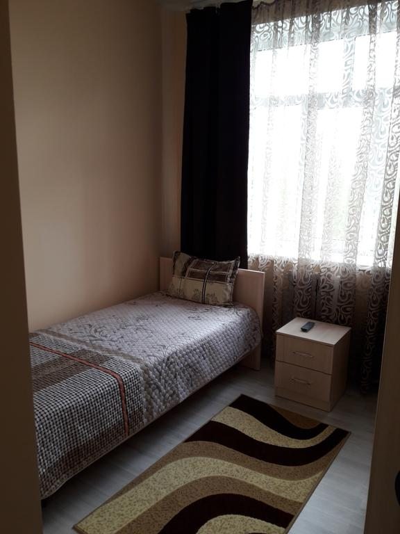 Двухместный (Двухместный номер с 2 отдельными кроватями и собственной ванной комнатой) отеля Спутник Авто, Камышлов