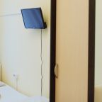 Трехместная комната с односпальными кроватями