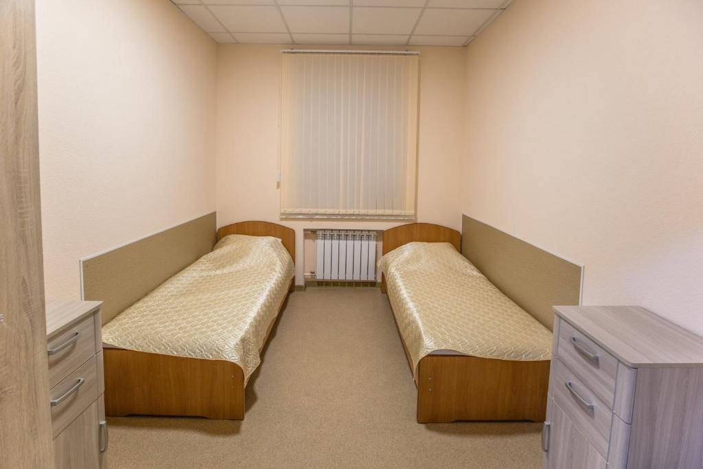 Двухместный (Двухместный номер с 2 отдельными кроватями и общей ванной комнатой) хостела Loft, Сургут