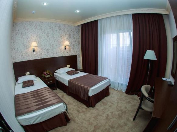 Фотография номера гостиницы Гранд Отель и СПА Майкоп