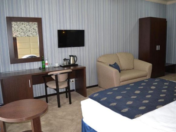 Фотография номера гостиницы Гранд Отель и СПА Майкоп