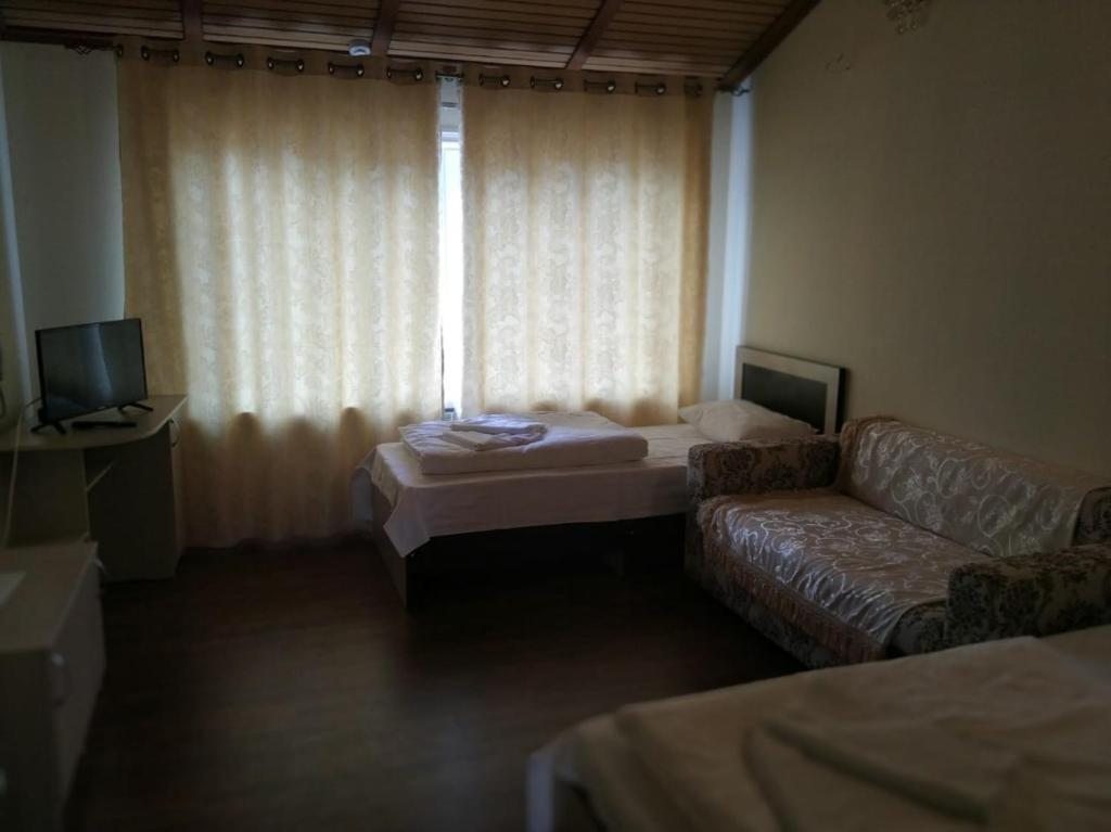 Двухместный (Двухместный номер с 2 отдельными кроватями и ванной) отеля Андалусия, Махачкала