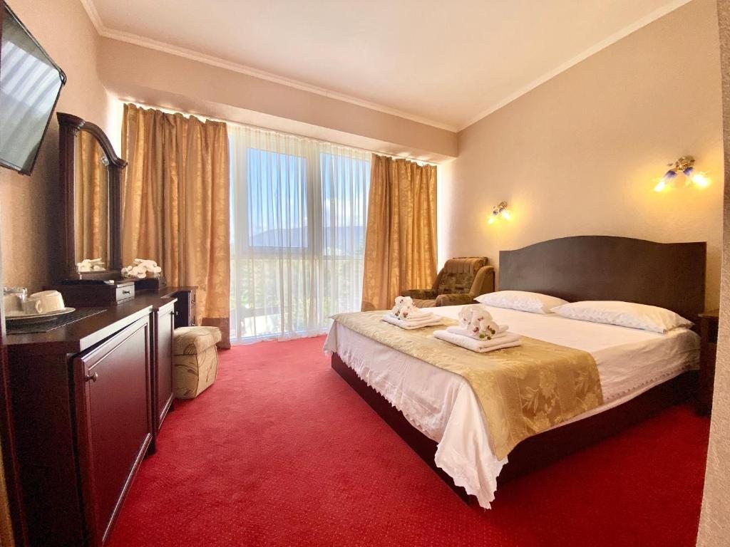 Двухместный (Стандартный двухместный номер с 1 кроватью или 2 отдельными кроватями) отеля Прибой, Лазаревское