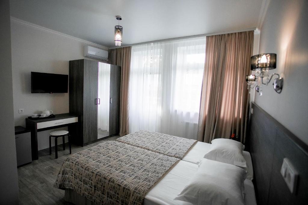 Двухместный (Двухместный номер с 1 кроватью или 2 отдельными кроватями и дополнительной кроватью) мини-отеля La V, Анапа