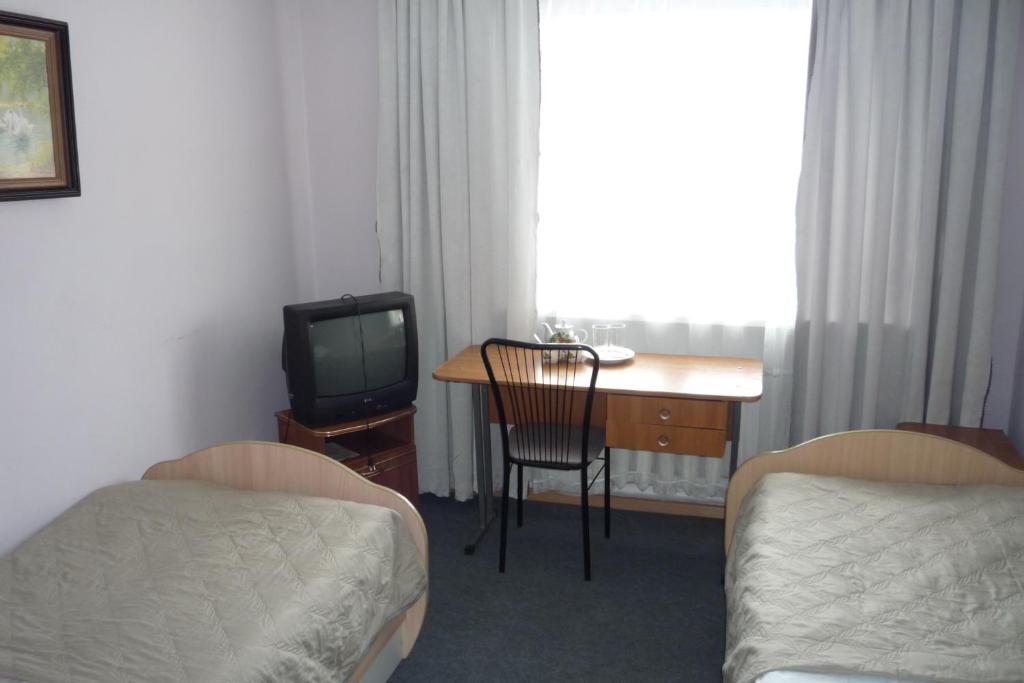 Двухместный (Двухместный номер с 2 отдельными кроватями и ванной комнатой) гостиницы Ковров