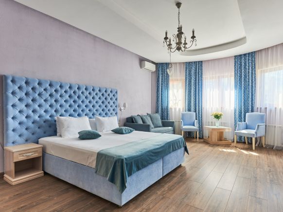 Фотография номера гостиницы Алм Хаус