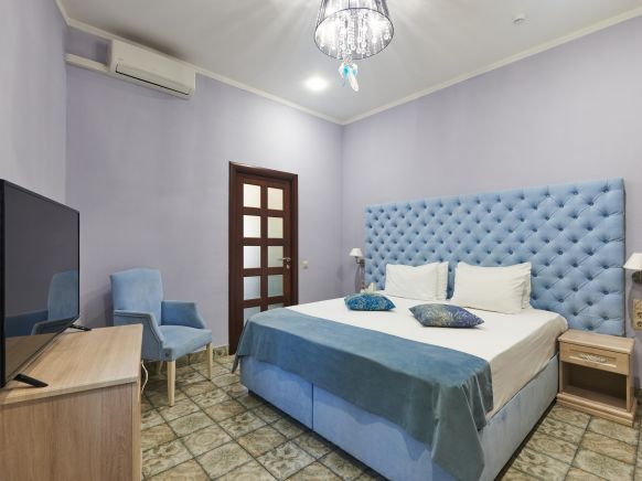 Фотография номера гостиницы Алм Хаус