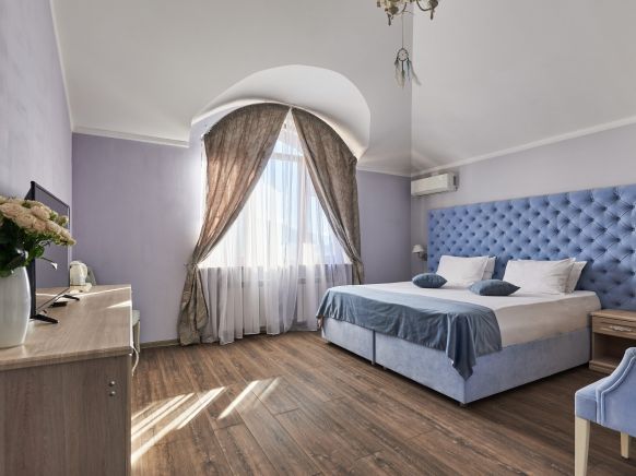 Фотография номера гостиницы Алм Хаус