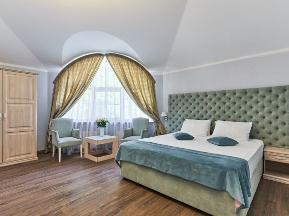 Фотография номера гостиницы Алм Хаус