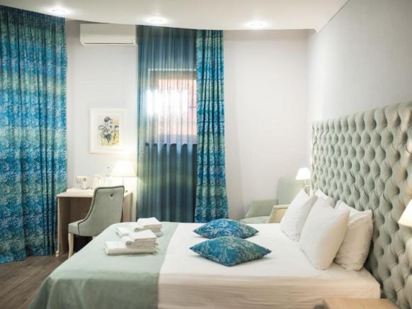 Фотография номера гостиницы Алм Хаус