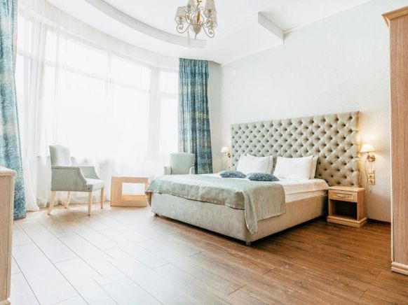 Фотография номера гостиницы Алм Хаус