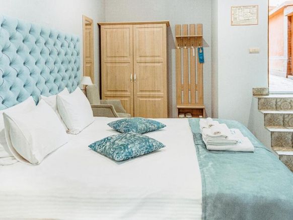 Фотография номера гостиницы Алм Хаус