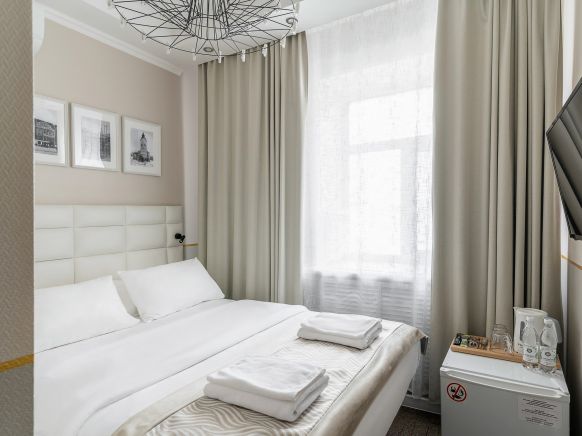 Фотография номера гостиницы KamInn