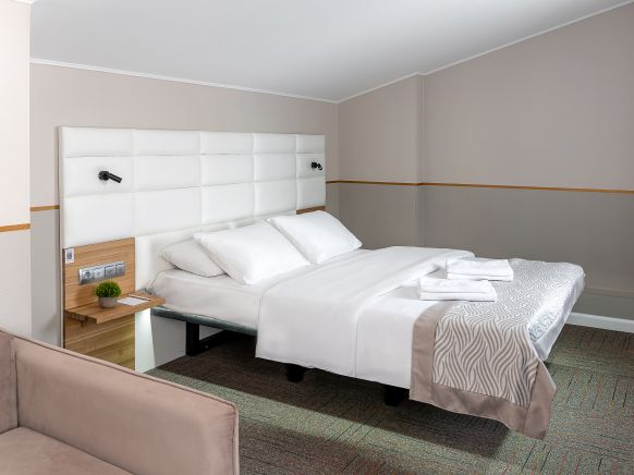 Фотография номера гостиницы KamInn