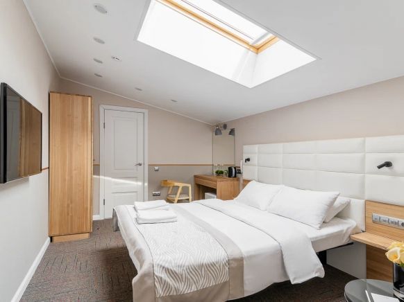 Фотография номера гостиницы KamInn