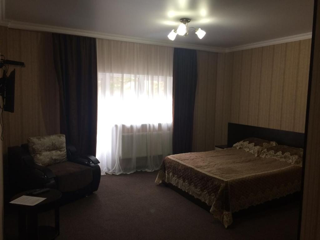 Двухместный (Двухместный номер Делюкс с 1 кроватью и балконом) отеля Премьер Азау, Терскол