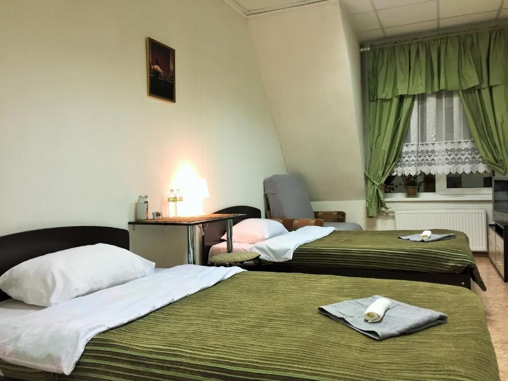 Двухместный (Двухместный номер с 2 отдельными кроватями и дополнительной кроватью) мини-гостиницы Мансарда на Лиговском, Санкт-Петербург