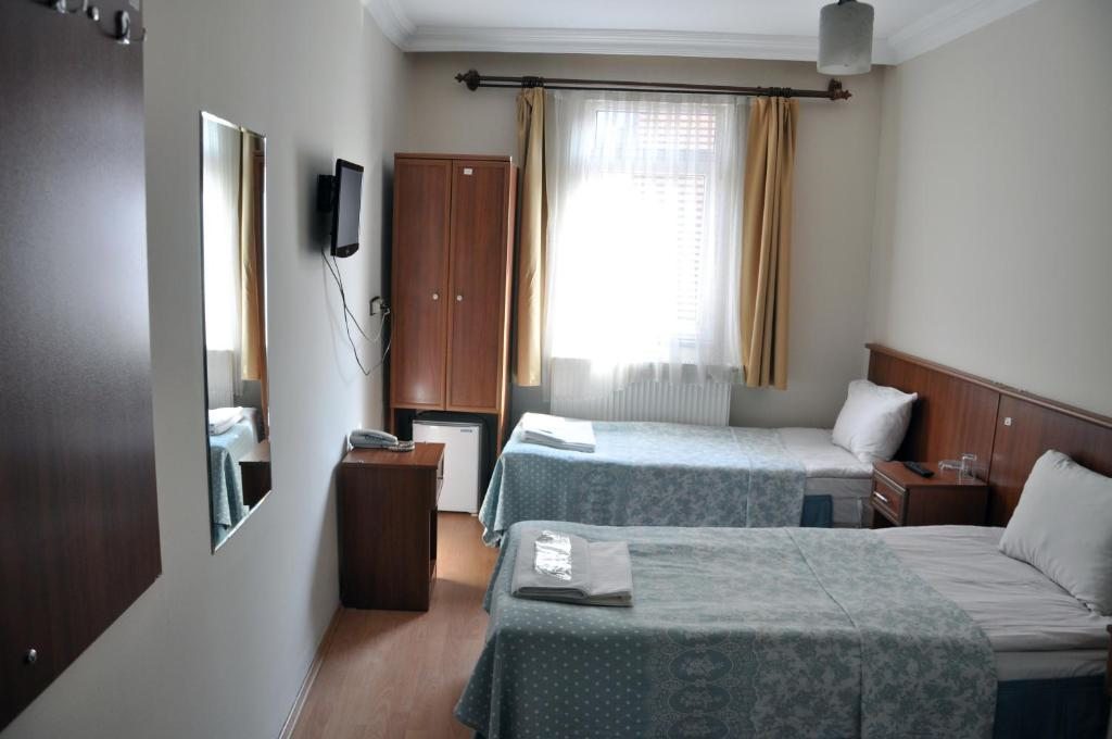 Двухместный (Классический двухместный номер с 1 кроватью и душем) отеля Hekimoğlu Hotel, Эрзурум
