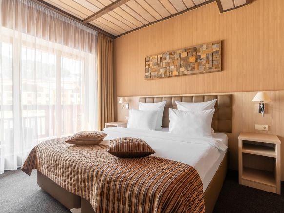Фотография номера гостиницы Arkhyz Royal Resort & SPA