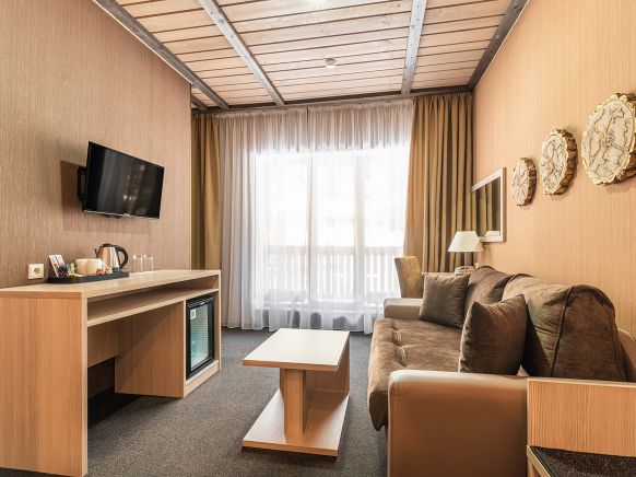 Фотография номера гостиницы Arkhyz Royal Resort & SPA