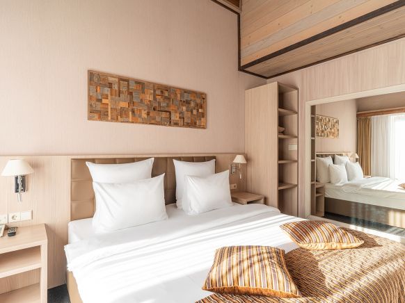 Фотография номера гостиницы Arkhyz Royal Resort & SPA